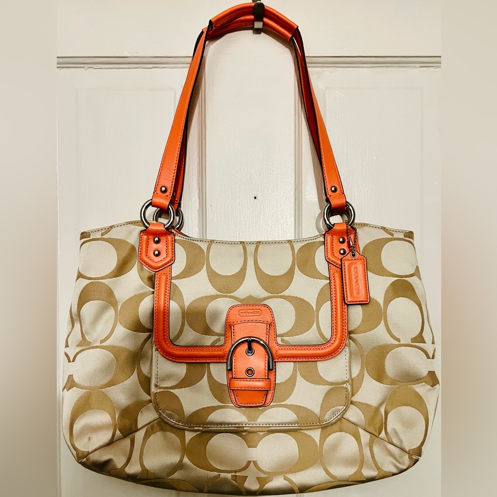 Medium coral and tan Coach bag. Used for 1 night. Basically new! Serial number - Picture 1 of 10